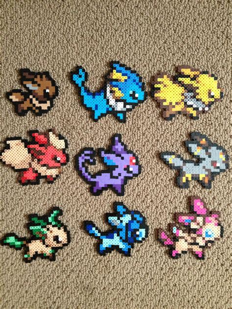 Once the design is cool, peel off the ironing paper. . Eeveelution perler beads